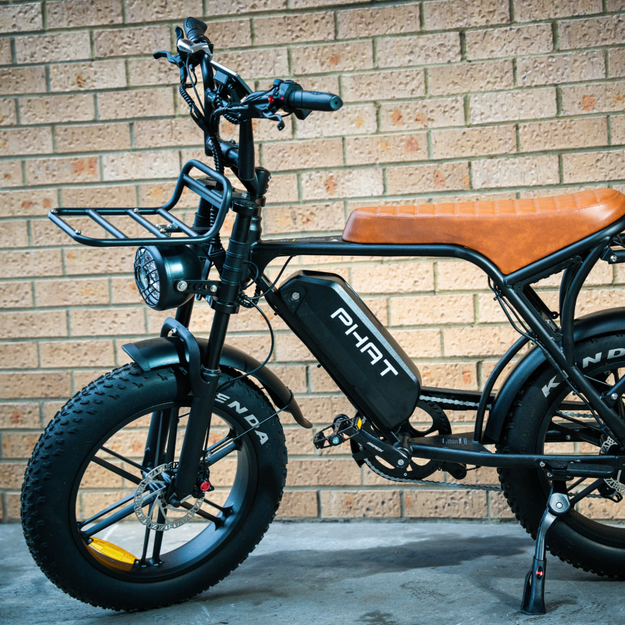 Phat eBike: Ride in Comfort and Style with Basket and Dual Seat!